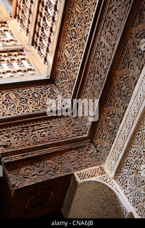 Detail of stucco and wood carving in the courtyard of Ali Ben Youssef Medersa/mosque in Marrakech, Morocco Stock Photo