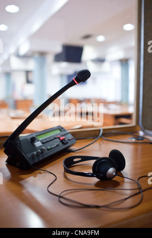 interpreting - Microphone and switchboard in an simultaneous interpreter booth Stock Photo