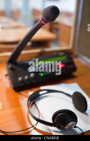 interpreting - Microphone and switchboard in an simultaneous interpreter booth Stock Photo