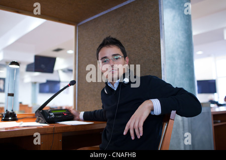 interpreting - Microphone and switchboard in an simultaneous interpreter booth Stock Photo