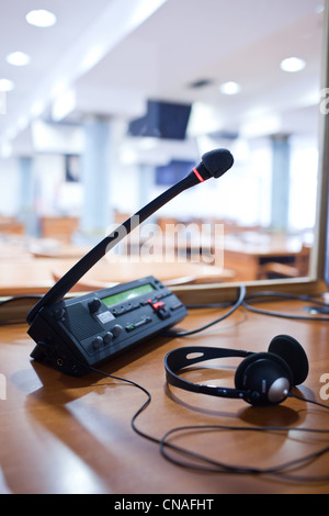 interpreting - Microphone and switchboard in an simultaneous interpreter booth Stock Photo