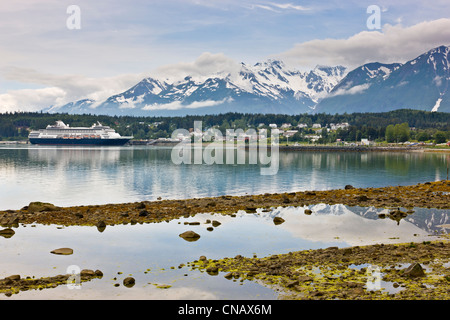 View from Portage Cove of Haines and Ft. Seward with a cruise ship docked in the harbor, Southeast Alaska, Summer Stock Photo