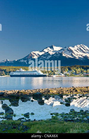 View from Portage Cove of Haines and Ft. Seward with a cruise ship docked in the harbor, Southeast Alaska, Summer Stock Photo