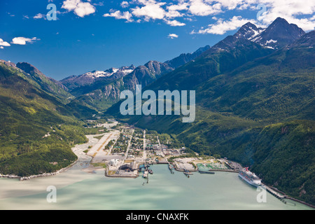 Aerial view of the city of Skagway with a cruise ship docked at port, Southeast Alaska, Summer Stock Photo