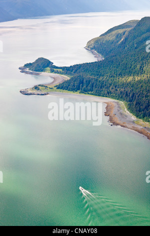 Aerial view of a commercial fishing boat heading down Chilkoot Inlet, Haines, Southeast Alaska, Summer Stock Photo