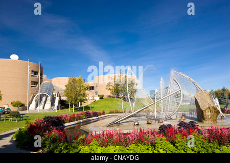 Loussac library and Carl Nesjar ice fountain in Midtown Anchorage, Southcentral Alaska, Anchorage, Summer Stock Photo