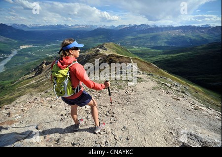 Female hiker at the top of the Mt. Healy Overlook Trail in Denali National Park & Preserve, Interior Alaska, Summer Stock Photo