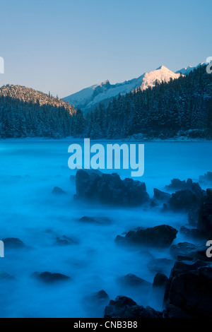 Wind driven winter waves pound the shoreline of Lynn Canal, Coastal Mountains, Inside Passage, Southeast Alaska, Winter Stock Photo