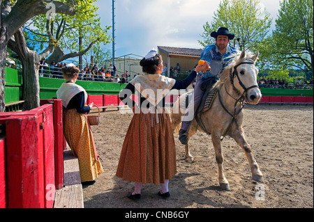 France, Gard, Aigues Vives, the local cowboys called Gardians have games of their own usually played in a bullring, here the Stock Photo