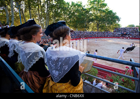 France, Gard, Beaucaire, Women dressed in the provencal costume of Arles at one of the greatest competition of Course Stock Photo