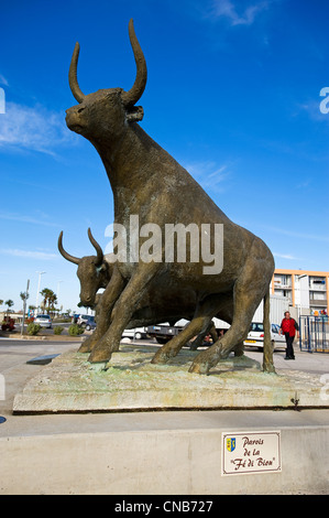 France, Gard, Camargue, Le Grau du Roi, statue of bulls of Camargue in front of the bullring Stock Photo
