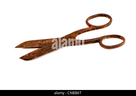 isolated on white old and rusted scissors Stock Photo