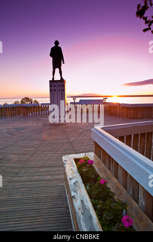 View of Captain James Cook tatue at sunset, Anchorage, Southcentral Alaska, Summer Stock Photo