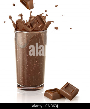 Chocolate cubes splashing into a chocolate milkshake glass. With two chocolate blocks on white floor and white background Stock Photo