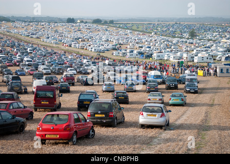 Cars and caravans parked in a field in Dorset, attending the Great Dorset Steam Fair Stock Photo