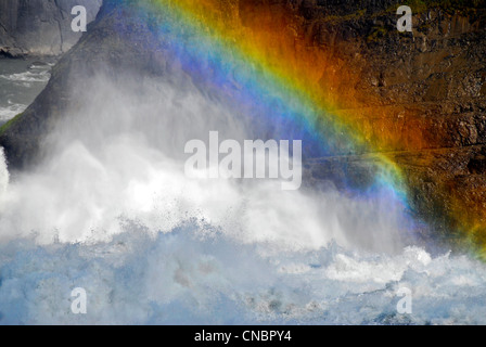 Rainbow in the spray of Virginia Falls on the Nahanni River in Canada's Northwest Territories. Stock Photo