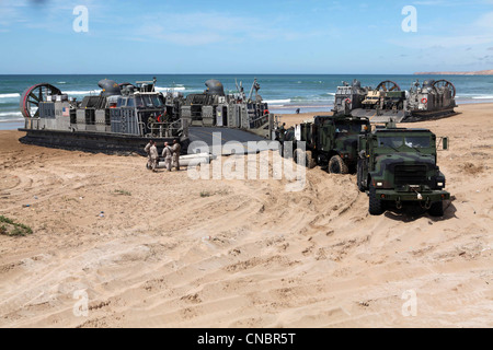 MOROCCO - 7-ton transport trucks from Combat Logistics Battalion 24, 24th Marine Expeditionary Unit, disembark onto the shores of Morocco April 10, 2012, to participate in the bi-lateral training exercise named African Lion 2012. The 24th MEU is participating in the exercise to continue to build on relationships between the U.S. and Moroccan forces and learn about each other's militaries. This exercise is the first event for the 24th MEU and Iwo Jima Amphibious Ready Group, which deployed in March on a regularly scheduled deployment to serve as a theater reserve and crisis response force Stock Photo