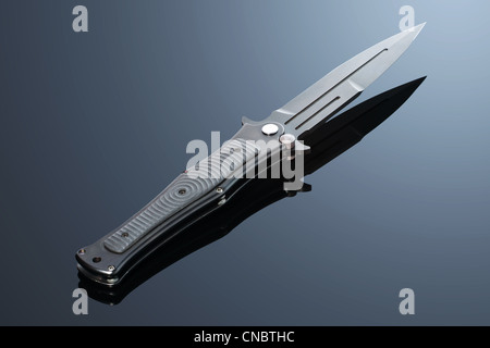 combat knife on gradient background Stock Photo