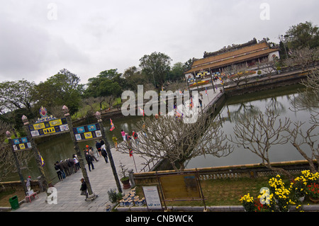 Horizontal elevated view of Trung Dao Bridge with Dien Thai Hoa (Palace of Supreme Harmony) at Royal or Imperial Citadel in Hue, Vietnam Stock Photo