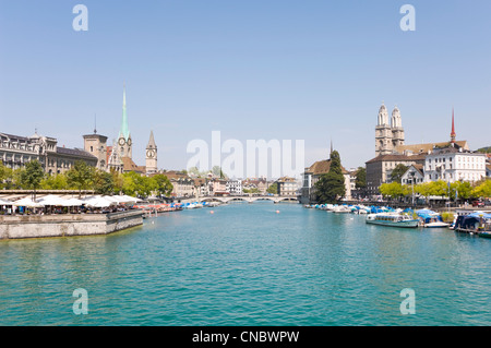 Horizontal wide angle of the stunning Zurich skyline including the spires of Fraumünster and Grossmunster on a sunny day. Stock Photo