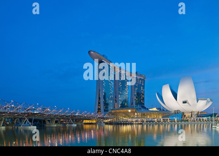 Singapore, Marina Bay, Helix Bridge (on the left) and Marina Bay Sands Hotel opened in 2010, and the ArtScience Museum in the Stock Photo