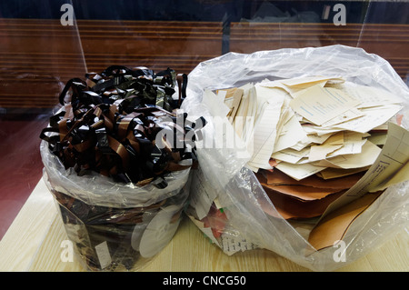 Destroyed tape and torn documents in the Stasi museum in Berlin Germany Stock Photo