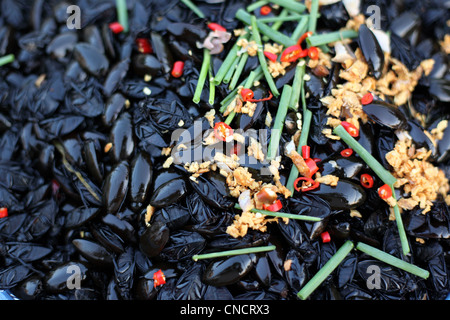 Deep fried insects for sale on street food cart. Stock Photo