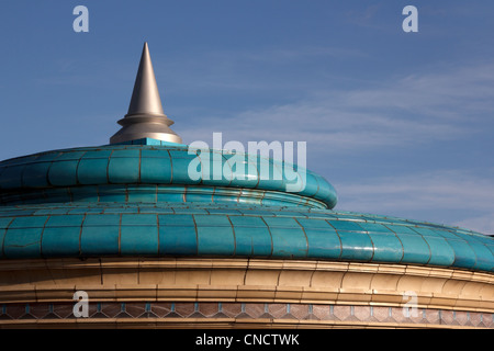 Ornate glazed ceramic tiled roof and metal spire on Eastbourne Bandstand, Eastbourne, East Sussex, England, UK Stock Photo