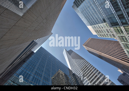 Looking up at skyscrapers on Sixth Avenue in Manhattan, New York City Stock Photo