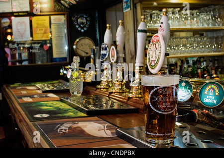 A pint on the bar of a traditional country pub Stock Photo