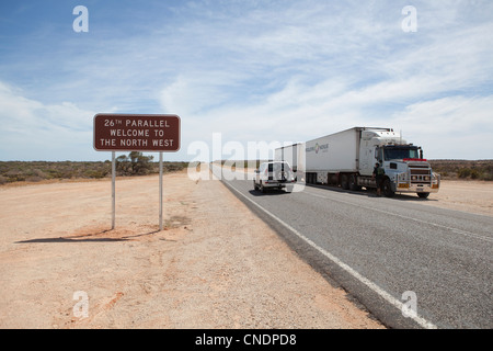 Signpost telling people they are passing the 26th Parallel in Western Australia. Stock Photo