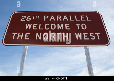 Signpost telling people they are passing the 26th Parallel in Western Australia. Stock Photo