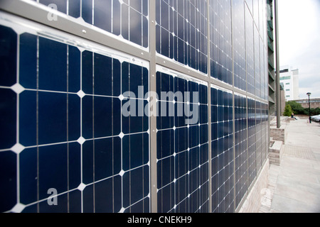 Solar PV panels on side of buiding in Edinburgh Stock Photo