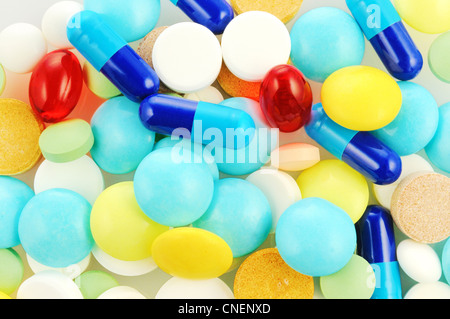 Background with different color tablets and pills Stock Photo