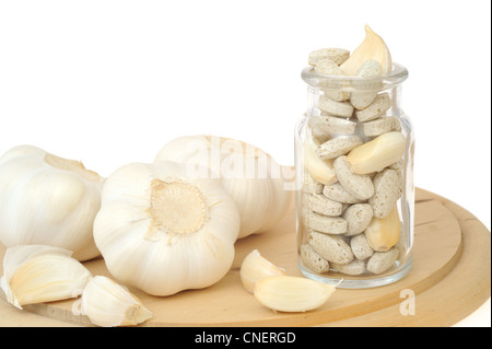 Garlic and herbal supplement pills isolated, alternative medicine concept