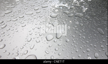 Water droplets on metal surface Stock Photo