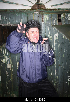 cyclist pulling face Stock Photo