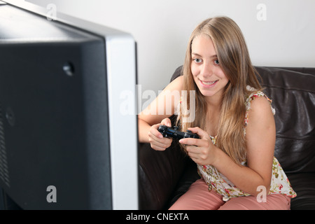 Happy Pretty Blonde Gamer Girl Playing Online Video Game on Her Personal  Computer Stock Photo - Alamy