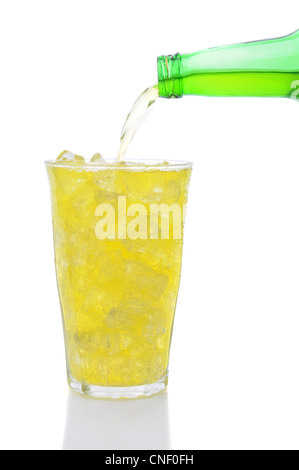 A bottle of Lemon Lime soda pouring into a glass filled with ice cubes over a white background.