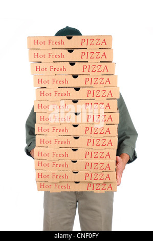 A Deliveryman hidden behind a large stack of pizza boxes he is carrying. Stock Photo