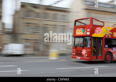 Oxford city sightseeing tour bus on St Giles street Stock Photo