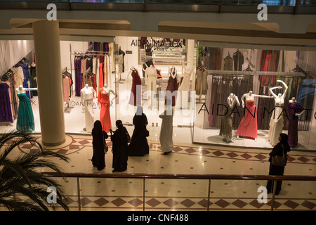 veiled women in the shopping mall at the Al Faisaliyah Center (or Al Faisaliah Cente), Riyadh, Saudi Arabia Stock Photo