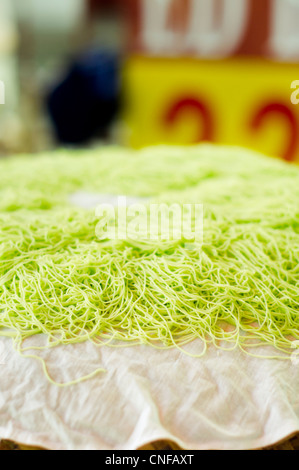 Iddiyappam or putu mayam, is a Tamil dish. It is popular in southern India, Sri Lanka, Malaysia, Indonesia, and Singapore. Stock Photo