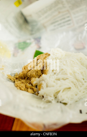 Iddiyappam or putu mayam, is a Tamil dish. It is popular in southern India, Sri Lanka, Malaysia, Indonesia, and Singapore. Stock Photo