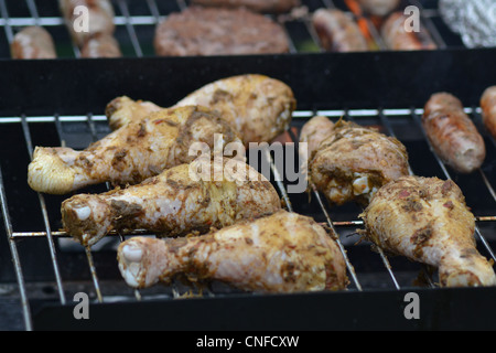 Jerk chicken on a barbecue Stock Photo
