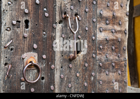 Oak studded door at entrance to Stokesay castle in Shropshire Stock Photo