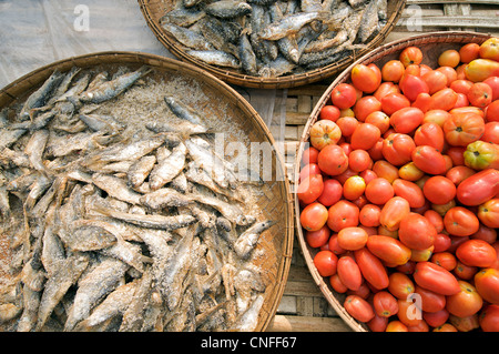 Dried fish and tomatoes for sale at Hsipaw market, Shan State, Burma Stock Photo