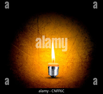 wax candle into lighting bulb, light bulb conceptual Image. Stock Photo