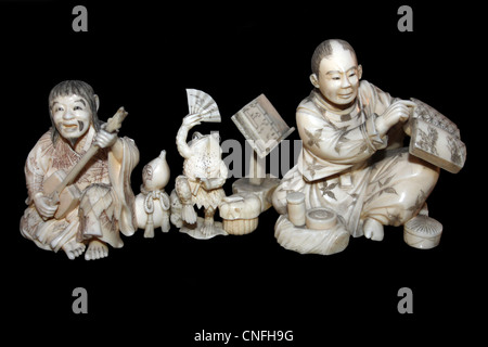 Carved Ivory Netsuke Figures Stock Photo