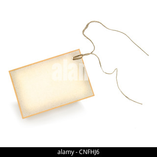 Blank Tag tied with open string cut out.White background. Stock Photo